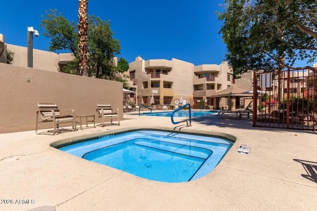 Building Photo - 4850 E Desert Cove Ave
