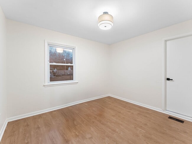 Building Photo - Fully Renovated 4-Bedroom Home with Large Fenced Yard in Clayton