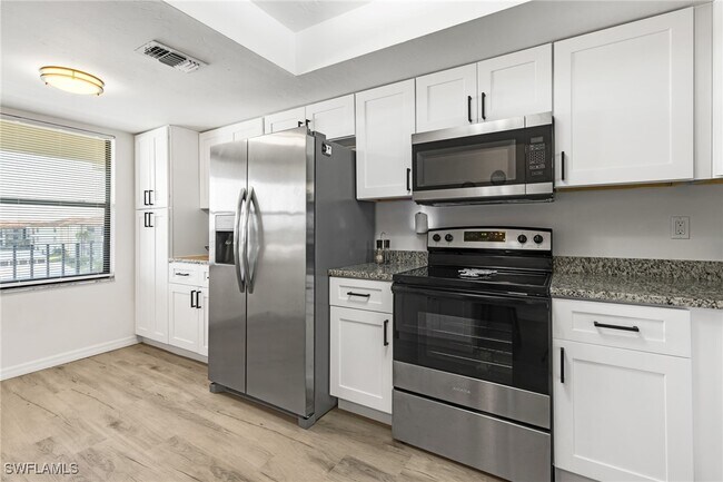Building Photo - 12621 Kelly Sands Way