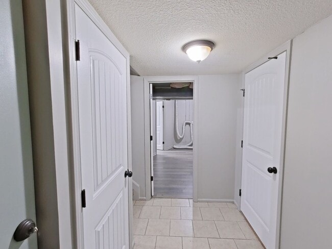 Building Photo - Lovely 3 bedroom/1.5 bath home with one car garage and finished basement.