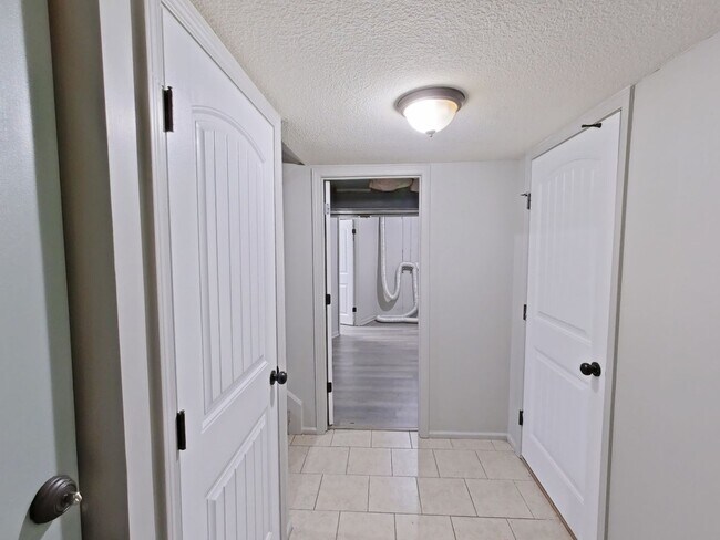 Building Photo - Spacious 3-Bedroom Home with Garage, Finished Basement & Fenced Yard