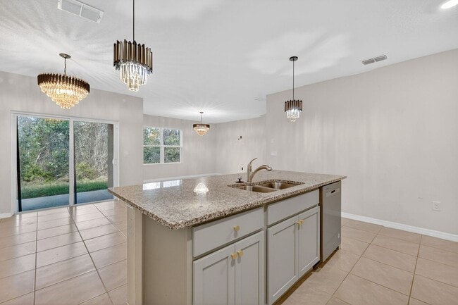 Building Photo - Available Now in Tavares | 2023 Built 4BR/2BA Home with 2-Car Garage