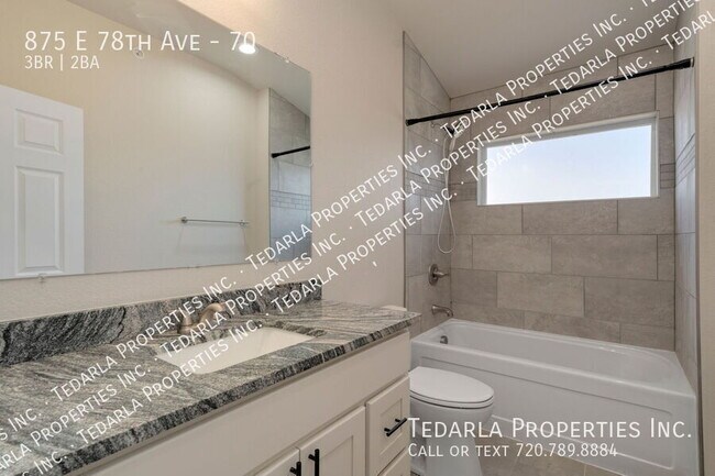 Building Photo - 875 E 78th Ave