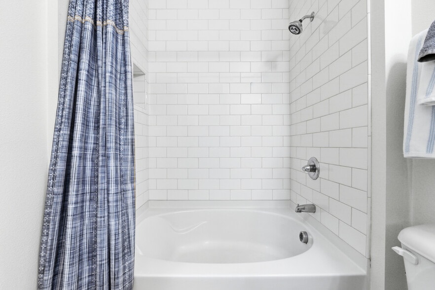 Shower and tub combo for everyday comfort and ease. - 2511 W Queen Creek Rd