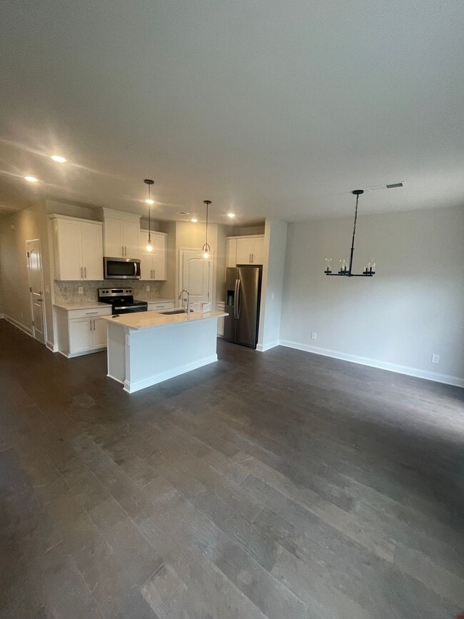Building Photo - BRAND NEW, energy-efficient condo townhous...