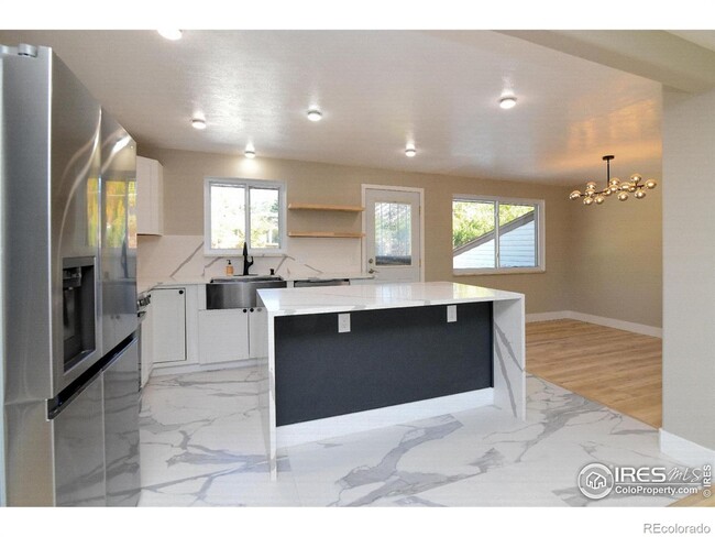 Building Photo - Remodeled home with separate finished base...