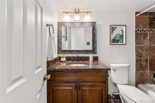 Building Photo - Sunny Corner Condo in the Heart of Capitol Hill | 2 Bed • 2 Bath • 795 Sq. Ft.