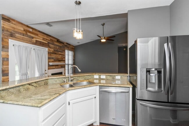 Kitchen open to great room - 10276 Lakeland Dr