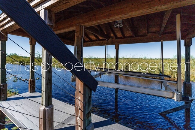 Building Photo - Stunning Double Waterfront 4/3 Home with Dock and Electric Boat Lift