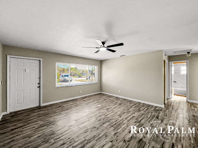Building Photo - Tree-Lined 2BR/1BA Fort Myers Duplex with Fenced Yard, Storage Shed & In-Unit Laundry!