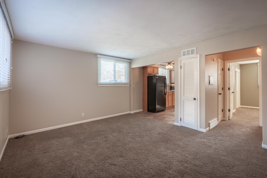 Looking from entry across living toward kitchen. - 316 N 35th St