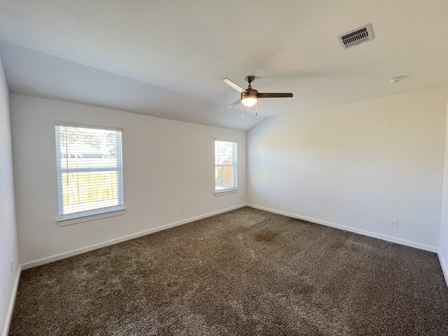 Building Photo - Modern 4-Bed Home with Office in Fosters Ridge Near The Woodlands | Open Layout & Resort-Style Am...