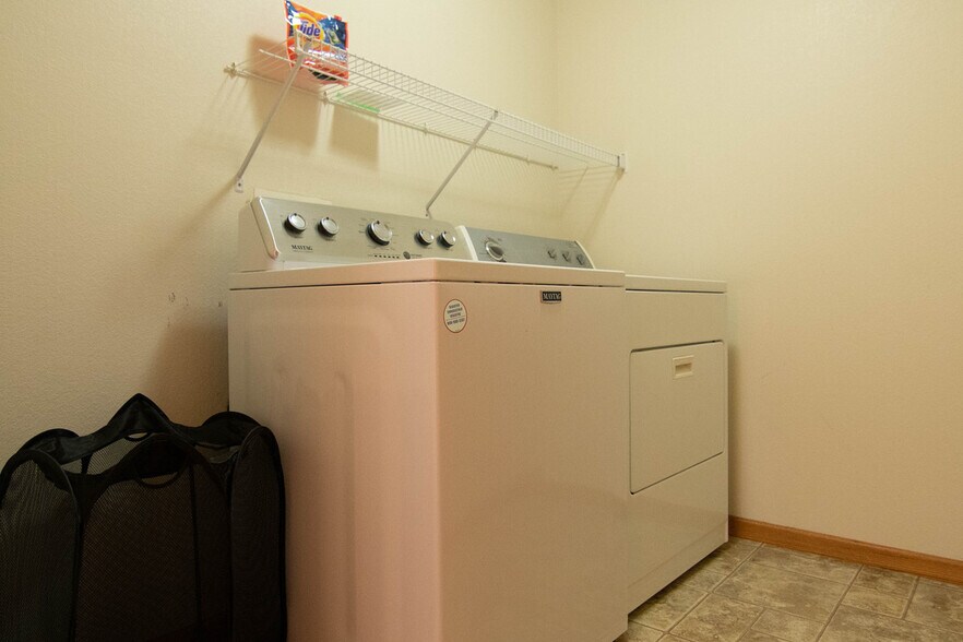 Laundry room conveniently located by all bedrooms - 129 16th St S