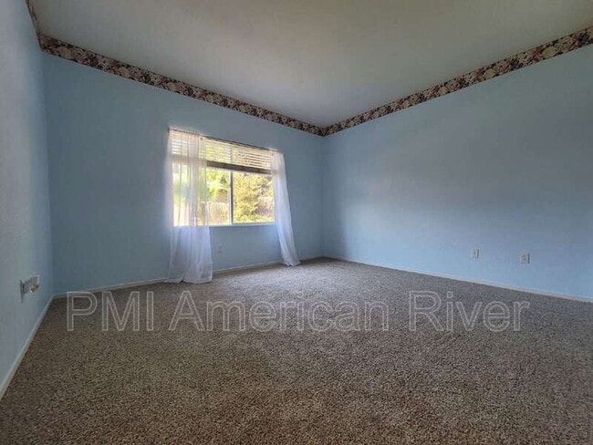 Building Photo - 8440 Zinnia Way