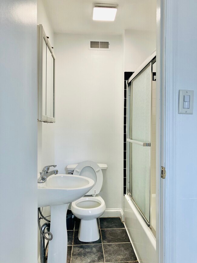 2nd floor full bathroom - 143 Davis St