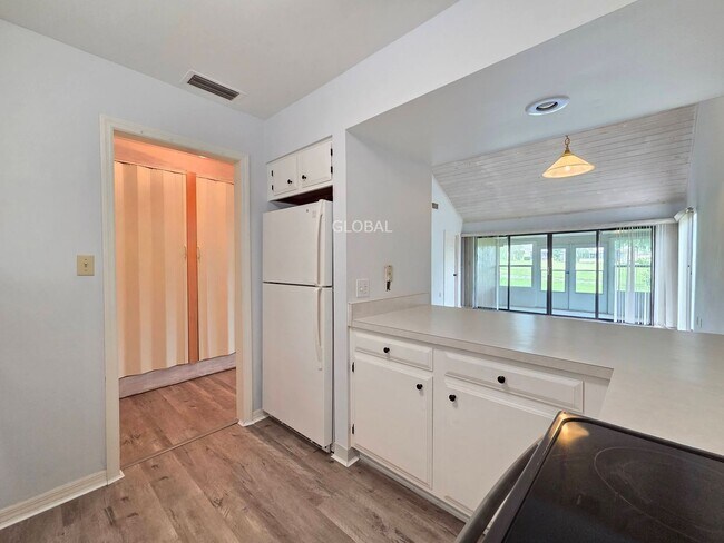 Building Photo - Charming 2-Bed, 2-Bath Condo Minutes from ...