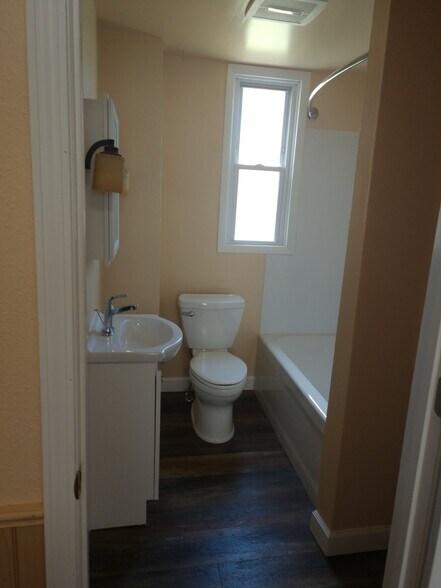 Bathroom (View 1) Deep soaking tub. - 1527 South 10th Street