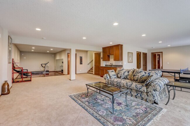 Building Photo - Grand 5 bed 4.5 bath Maple Grove Home w/ 3-Car Garage! Fully Furnished