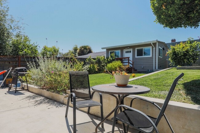 Spaciouls yard with fruit trees and garden. - 431 Athol Ave