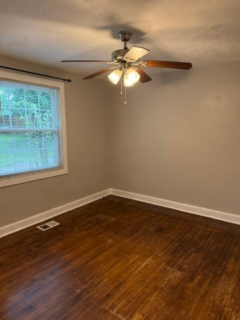 Building Photo - Two Bedroom, Two Bath home with large back yard and attached garage!