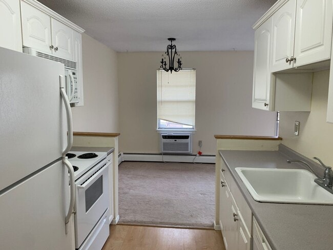 Building Photo - Upper Level Unit With Heat and Hot Water I...