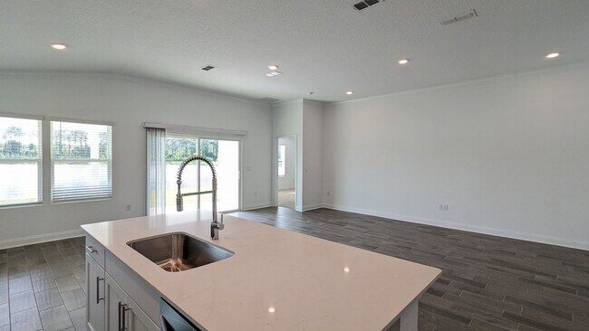 Building Photo - PREMIUM FINISHES AND POND VIEW!!  A PREMIU...