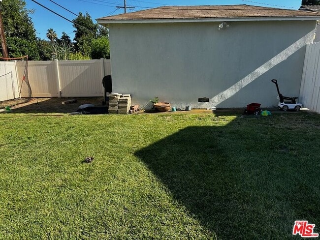 Building Photo - 5048 Enfield Ave