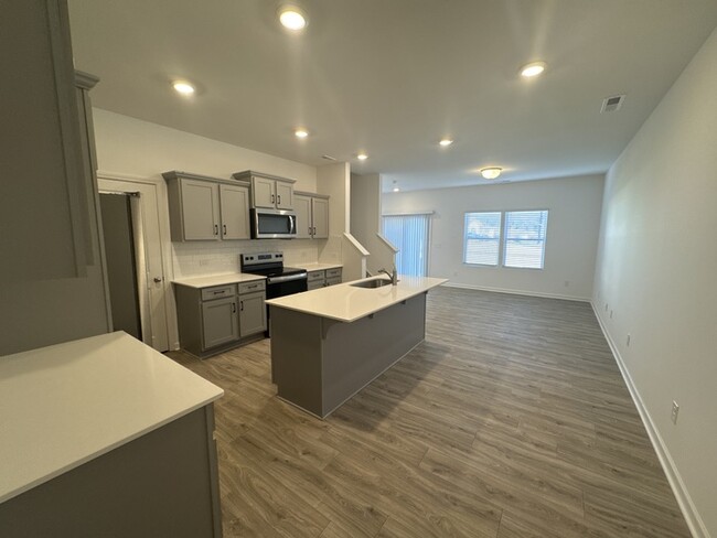 Building Photo - Brand new three bedroom 2 1/2 bath townhom...