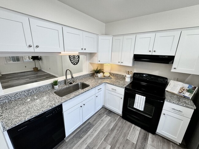 Building Photo - 3-Bedroom Townhome Ready NOW!! Completely Updated - Fenced Backyard - Exterior Storage!