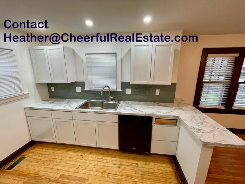 New kitchen with lots of storage and dishwasher - 2838 Allen Ave