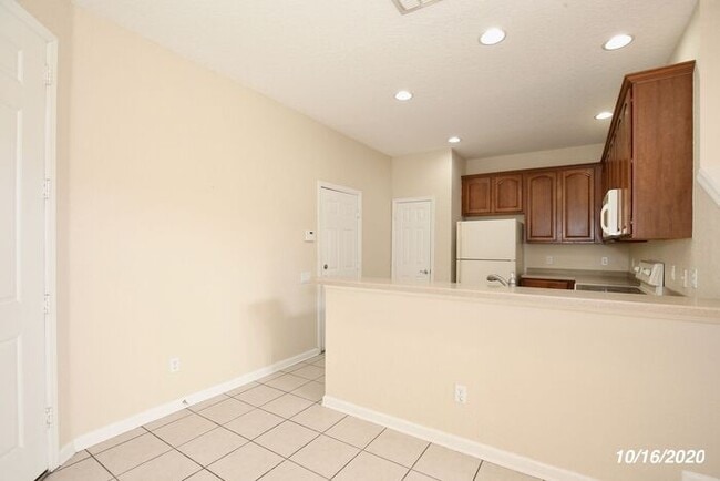 Building Photo - Beautiful 3/3.5 Townhome with a Spacious 2 Car Garage in the Gate Guarded Community of Spring Isl...