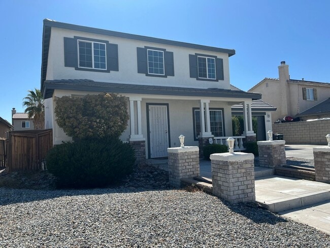Building Photo - Spacious 5-bedroom, 3-bathroom home in Ade...