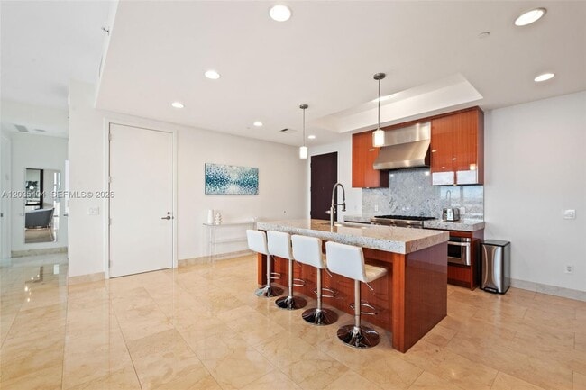 Building Photo - 9705 Collins Ave