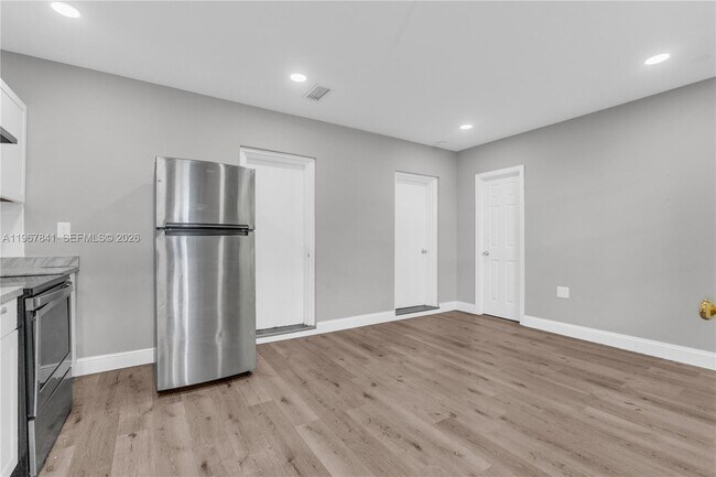 Building Photo - 6940 NW 6th Ct