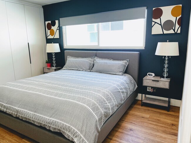 King size bed with ample daylight and blackout shades - 1907 Malcolm Ave