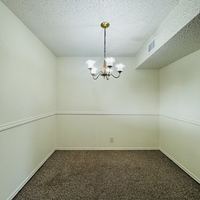 Building Photo - Inviting Townhome at Maison Helena Townhomes in Nederland, TX