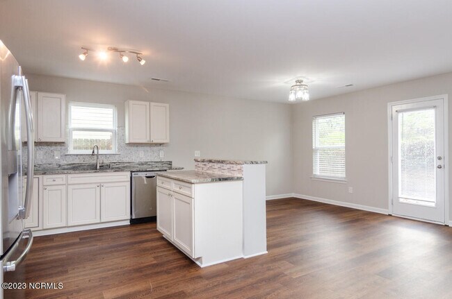 Building Photo - 6516 Rustling Leaves Way