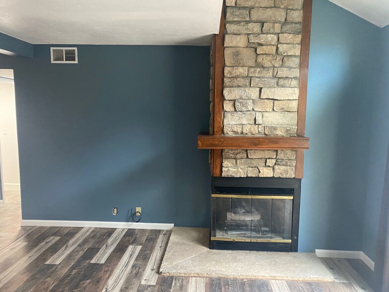 Wood fireplace - 18404 E Kepner Pl