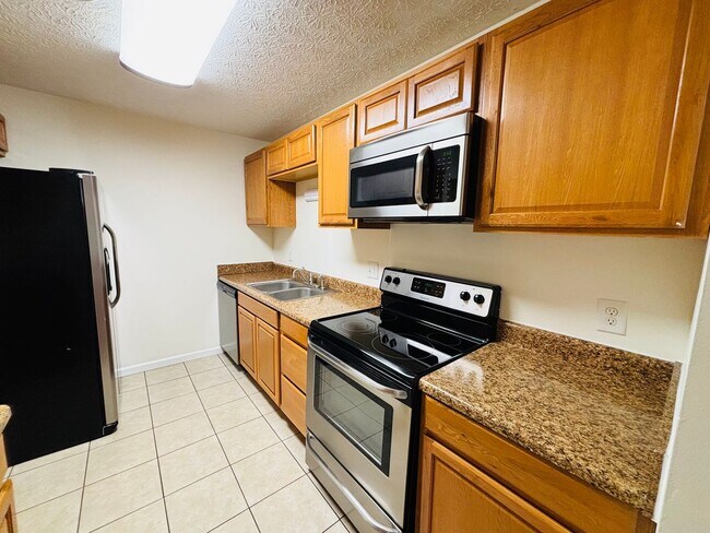 Building Photo - * RE-RENTAL AVAILABLE 8/14/26 * 4 Bedroom, 2 Bath Apartment