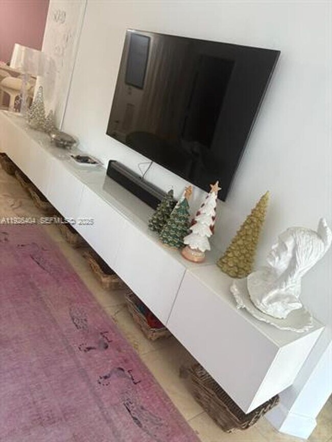 Building Photo - 4779 Collins Ave