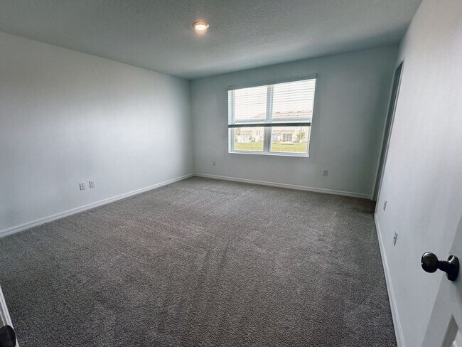 Building Photo - Beautifully maintained 3/2.5 townhome and community with pool!