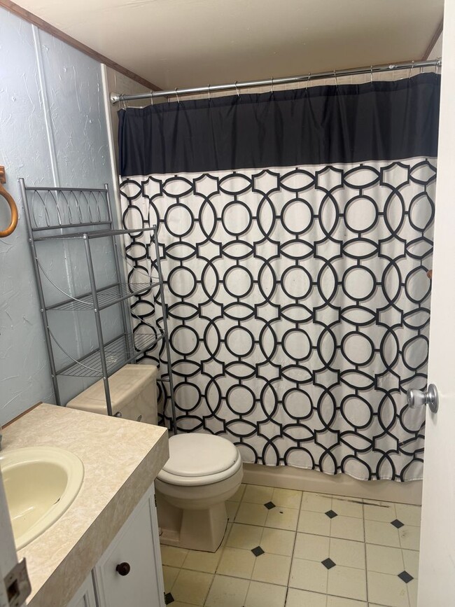 Building Photo - Spacious 3-Bedroom with Storage Shop & Off...