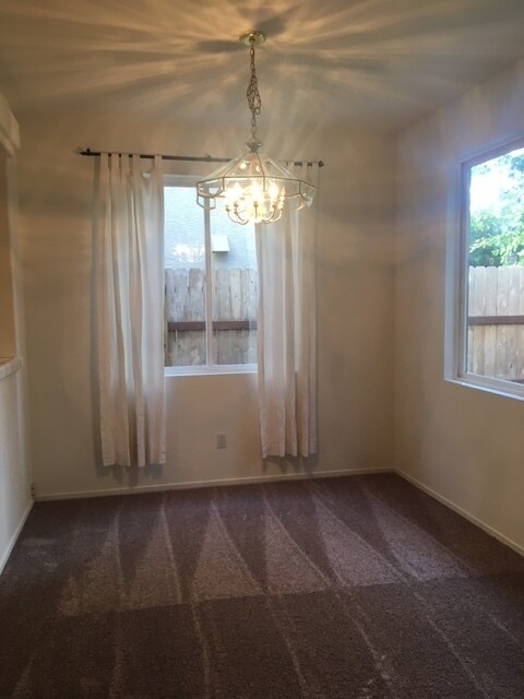 Building Photo - Three bedroom in gated community.