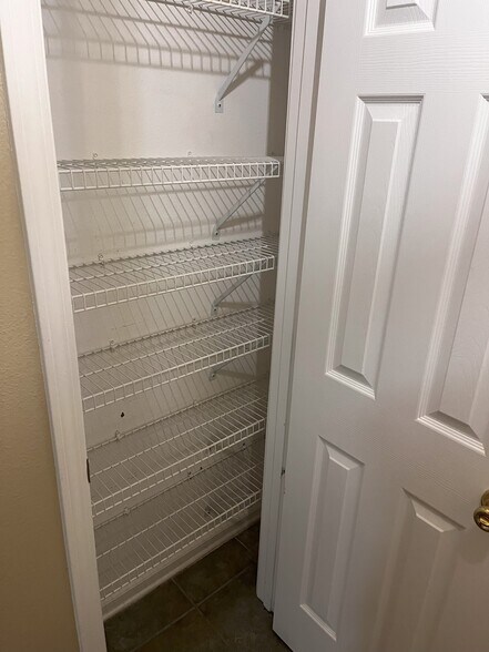 Pantry by front door - 10550 Baymeadows Rd