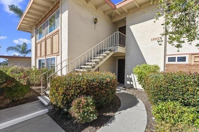 Building Photo - Poolside Living at Its Finest – Turnkey 3BR Condo with Direct Patio Access to the Pool