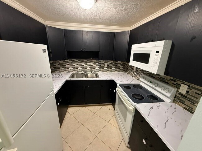 Building Photo - 1055 W 77th St