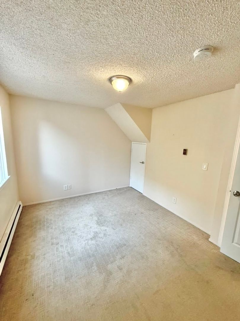 Building Photo - 4259 8th Ave NE