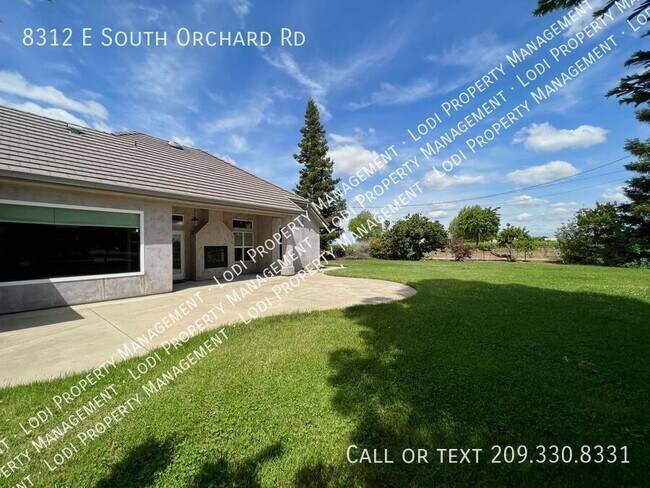 Building Photo - 8312 E Orchard Rd