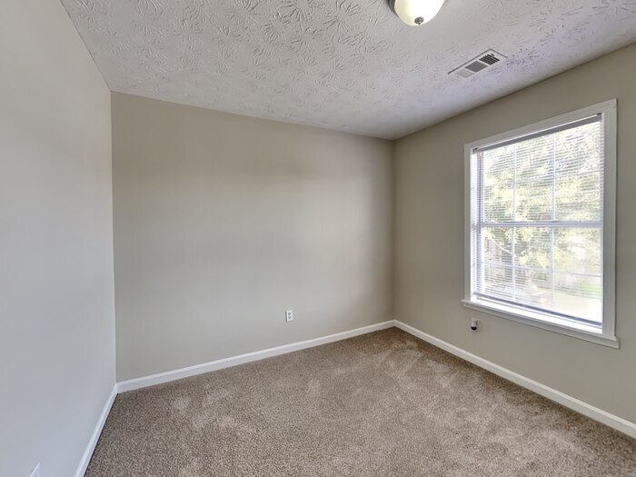 Building Photo - 6156 Raleigh Oaks Ct