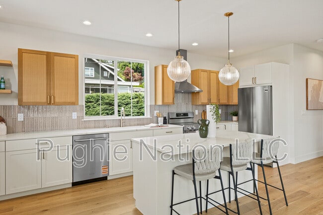 Building Photo - 4142 3rd Ave NW